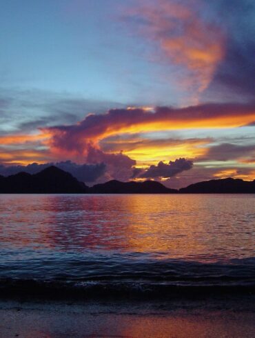diving in el nido philippines beautiful sunset