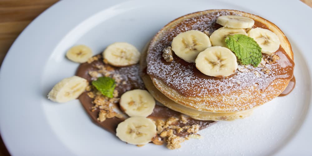 Pancakes with Nutella, Salted Caramel, and Bananas from Chillax Cafe