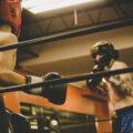 01:25Claude responded: Two boxers sparring in headgear and gloves inside a boxing ring at a gymTwo boxers sparring in headgear and gloves inside a boxing ring at a gym