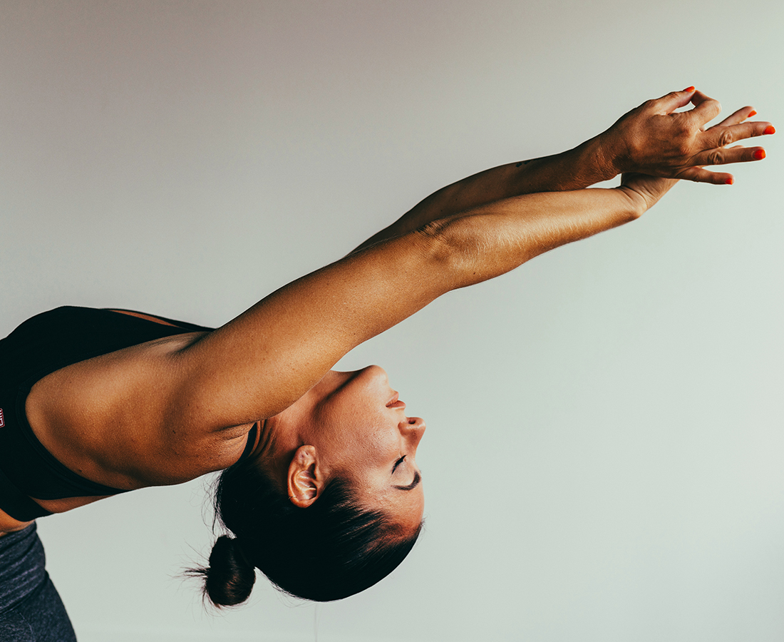 lady stretching in yoga pose