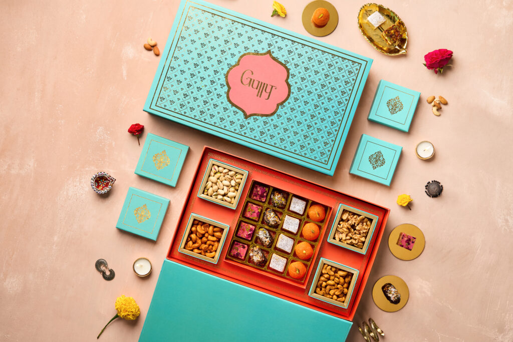 Gully Signature Diwali Gift Set with mithai, nuts, Penfolds Koonunga Hill Shiraz, Patchi chocolates and scented candles.