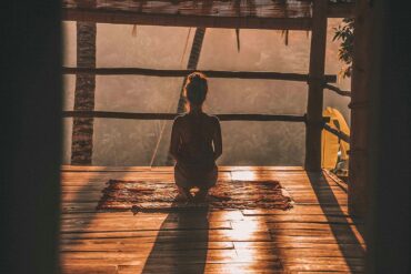 girl meditating in the morning