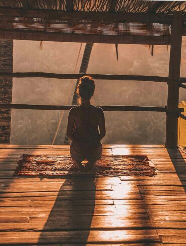 girl meditating in the morning