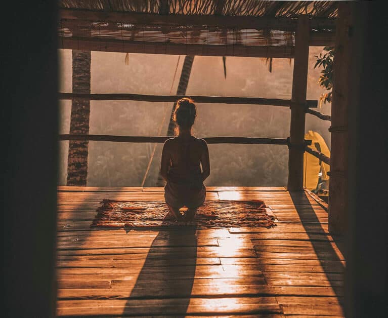 girl meditating in the morning