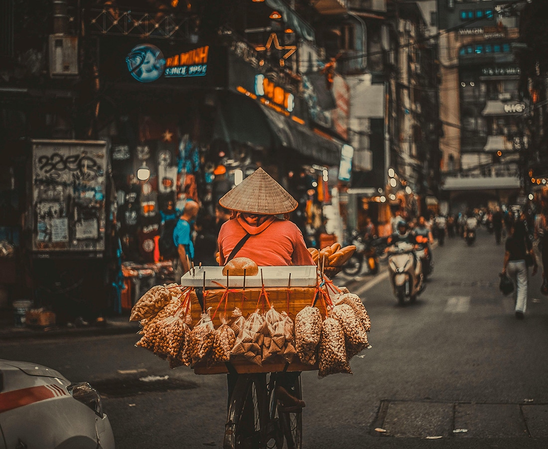 Photo of a Person Selling Snack on a Bicycle