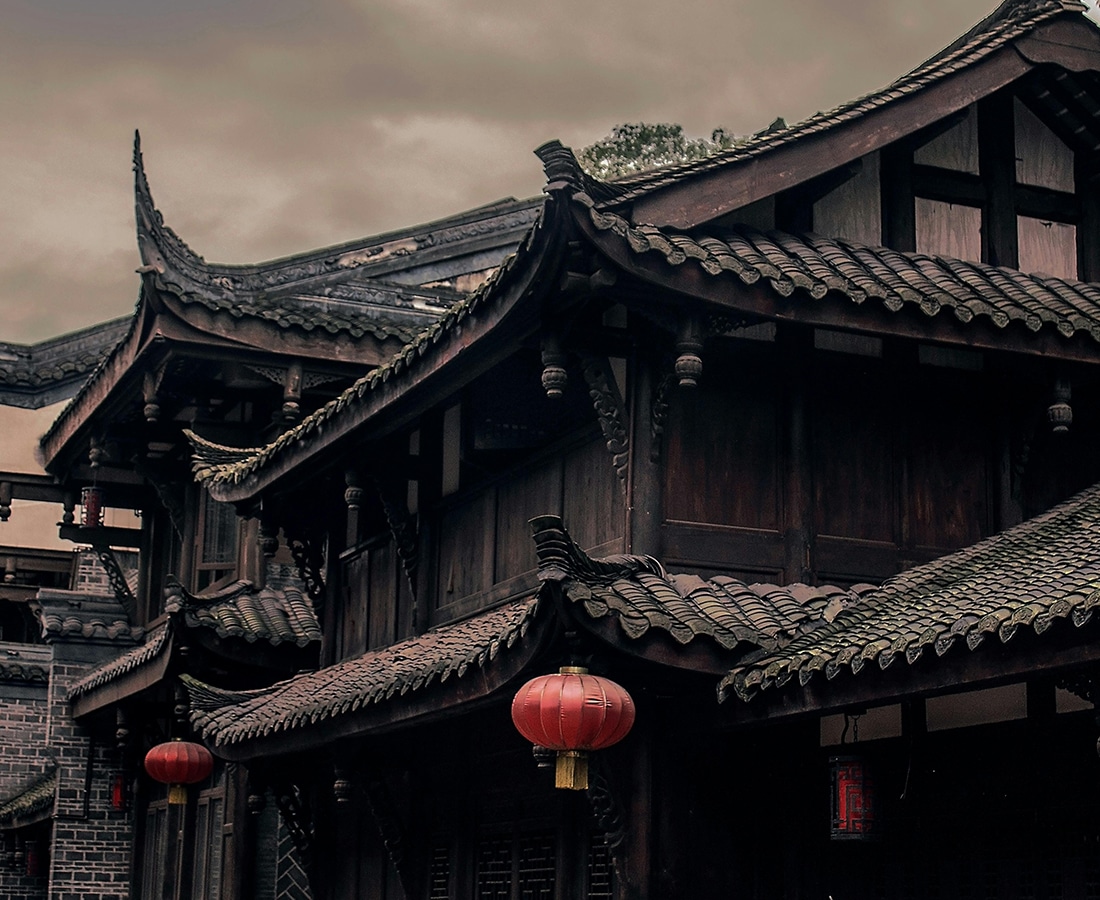 Closeup Photo of Brown and Black Wooden Houses in China