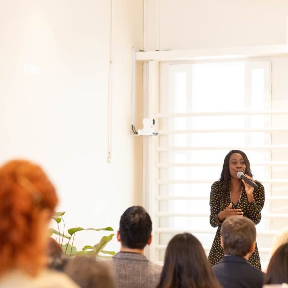 Elika giving a talk