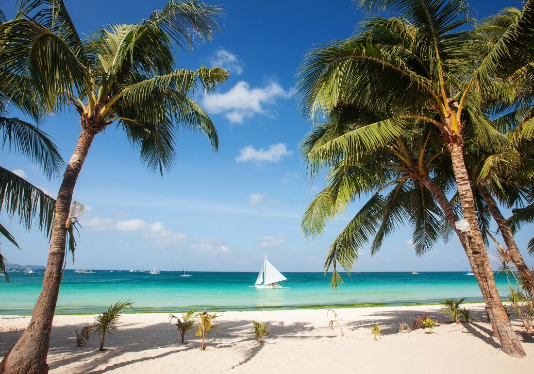a photo of the pristine white sand beaches of boracay island in philippines