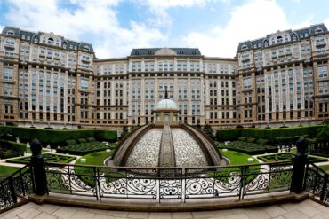 a photo of the jardim secreto and hotel facade of grand lisboa palace resort in macau