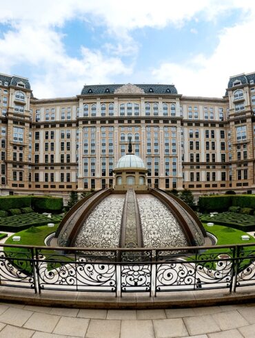 a photo of the jardim secreto and hotel facade of grand lisboa palace resort in macau