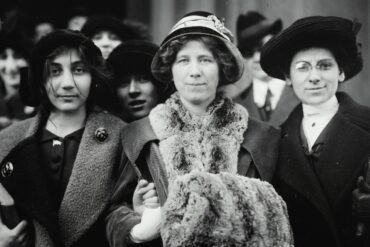 a photo of mink brigade - Unidentified striker, Fola La Follette and Rose Livingston