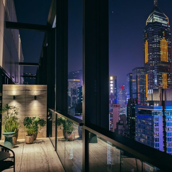an image of the skyscraper view from the suite at the hari hong kong in wanchai