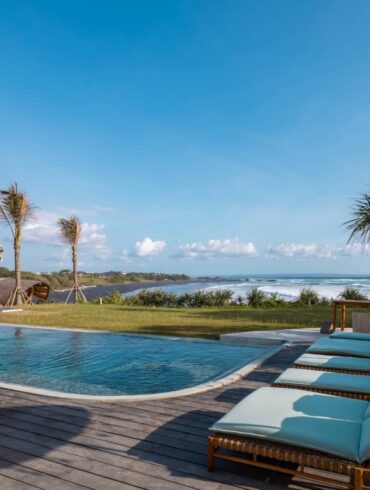 an image of the pool view at oshom bali overlooking the ocean