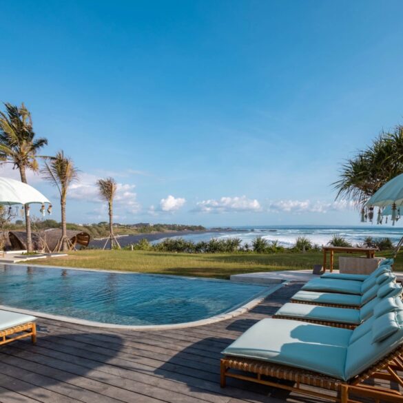 an image of the pool view at oshom bali overlooking the ocean