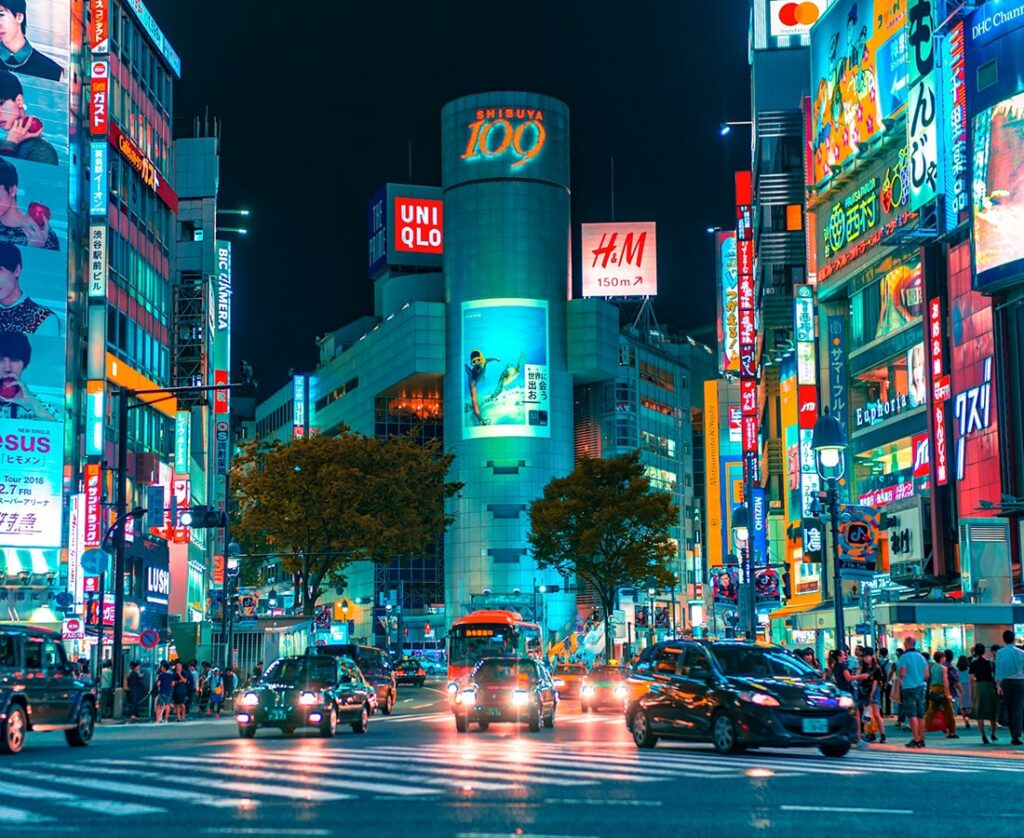 a photo of shibuya street at night in tokyo