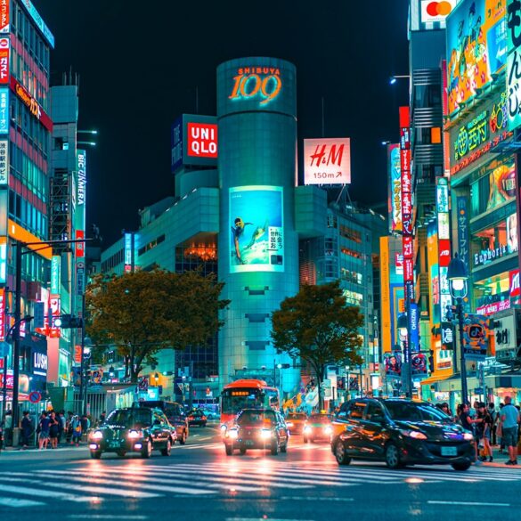 a photo of shibuya street at night in tokyo