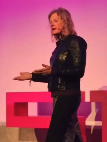 Dr. Vivienne Ming during her talk at SIM Conference