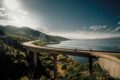 Motorcyclists riding across a scenic curved bridge over a large lake surrounded by green mountains under a bright afternoon sun in Arizona.