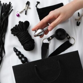 A collection of sex toys on a light background.