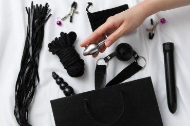 A collection of sex toys on a light background.