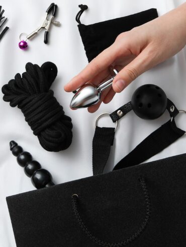 A collection of sex toys on a light background.