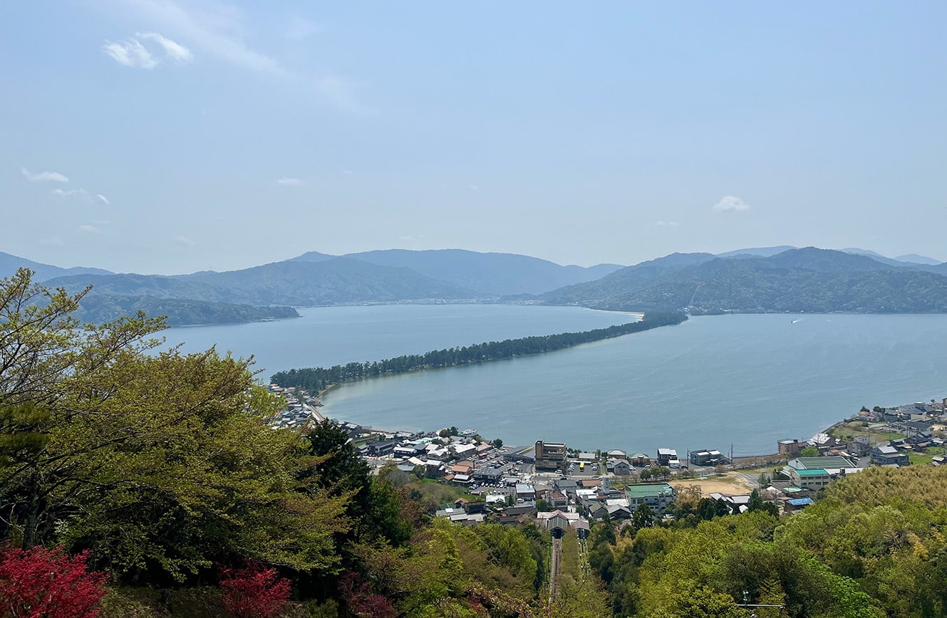 Panoramic view of Amanohashidate sandbar from Kasamatsu Park observation deck, Kyoto Prefecture, Japan.