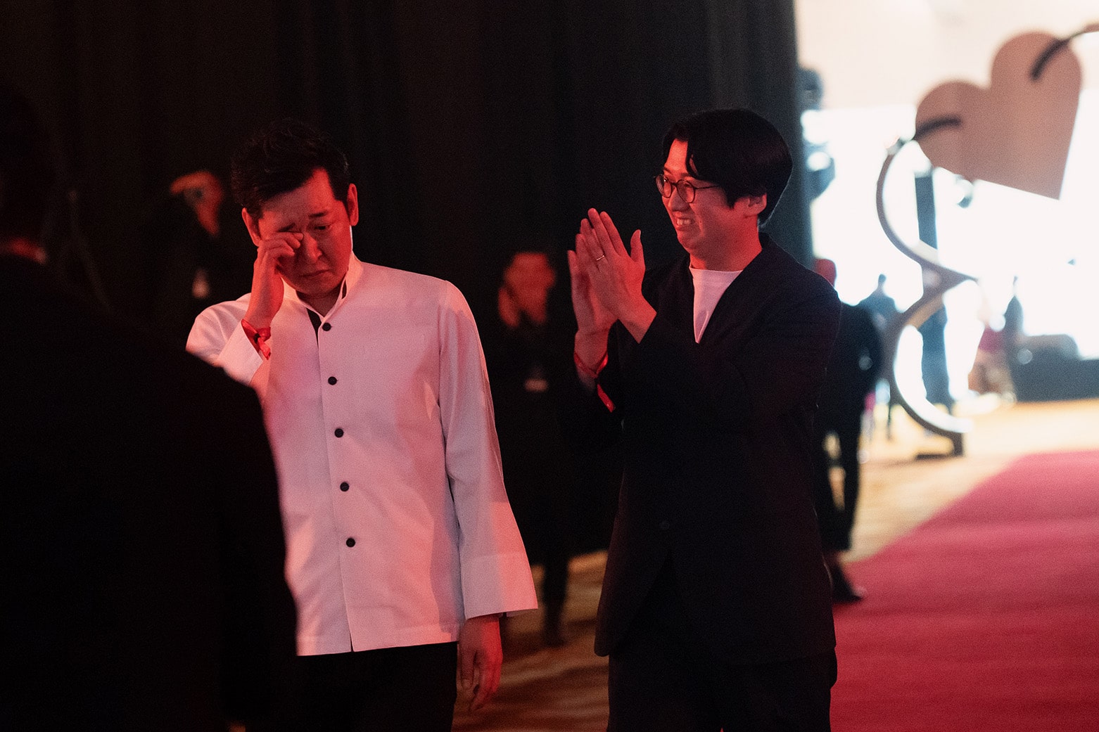 Chef Yoshio Sakuta tears up after Sushi Sakuta is awarded two Michelin stars at the Michelin Guide Singapore 2025, capturing a heartfelt milestone moment.