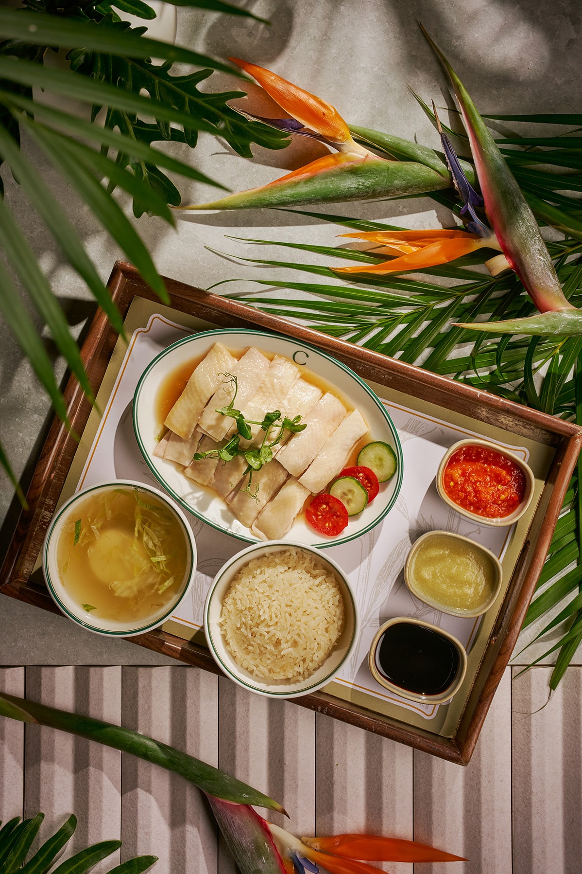Signature Mandarin Chicken Rice set with soup and condiments at Chatterbox Café, Resorts World Sentosa, Singapore
