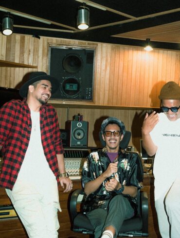 Batavia Collective, the jazz trio from Jakarta smiling in the studio.