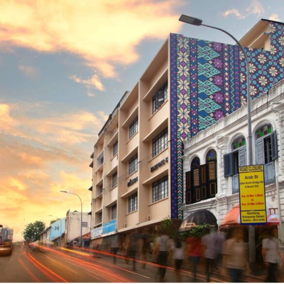 Exterior view of Coliwoo Hotel Kampong Glam in Singapore, featuring geometric facade inspired by traditional Malay textile patterns