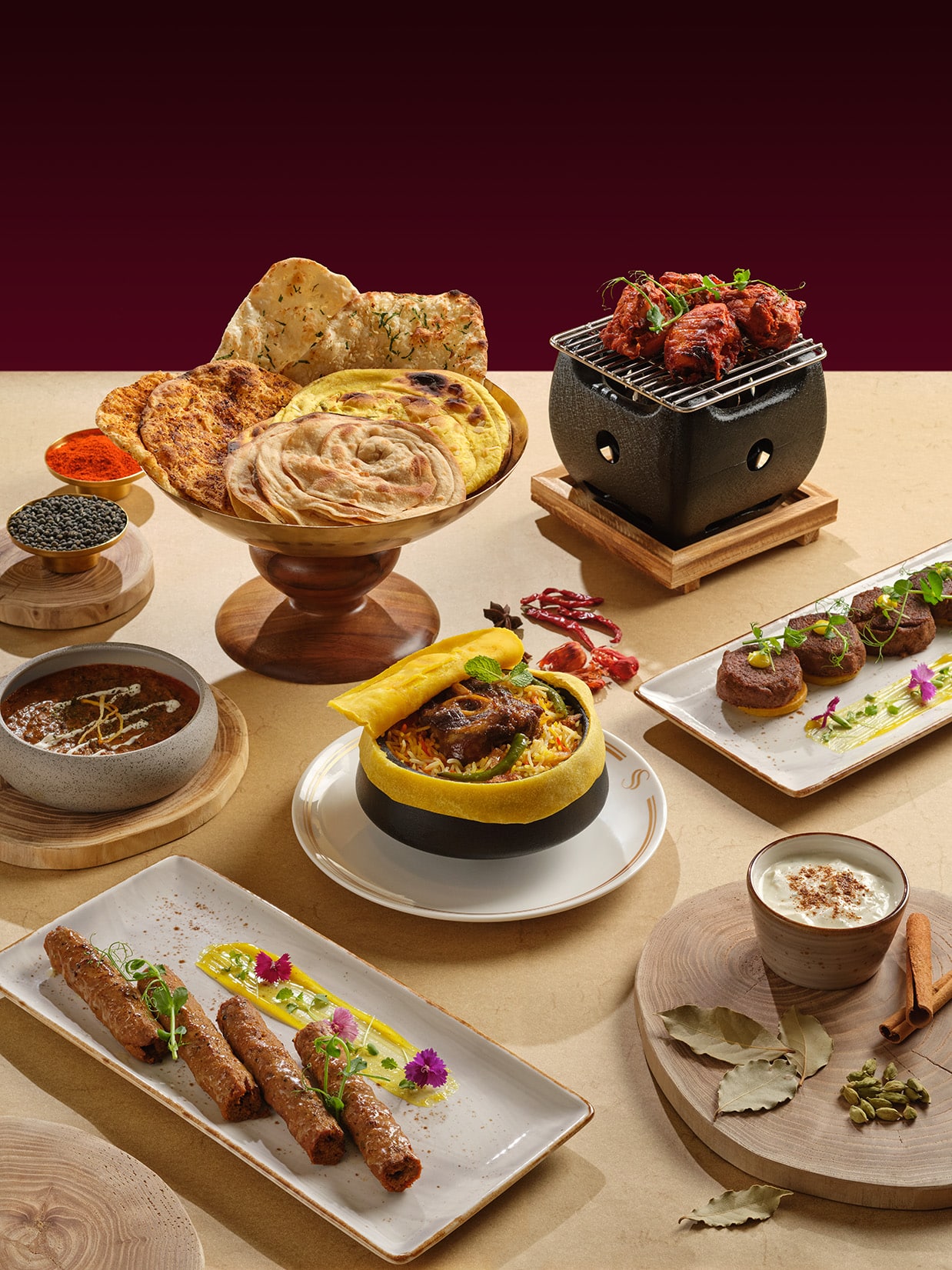 North Indian royal cuisine at Sansara, Grand Copthorne Waterfront – naan, tandoori chicken, biryani, and kebabs in a luxurious setup.