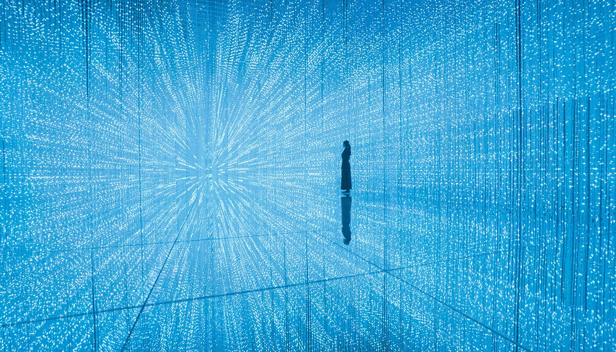 Immersive Crystal Universe installation by teamLab at ArtScience Museum, Marina Bay Sands, glowing with thousands of LED lights.