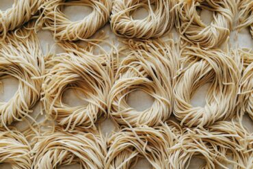 Fresh handmade noodles on a baking sheet