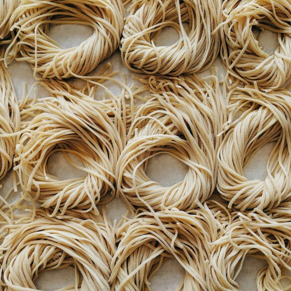 Fresh handmade noodles on a baking sheet