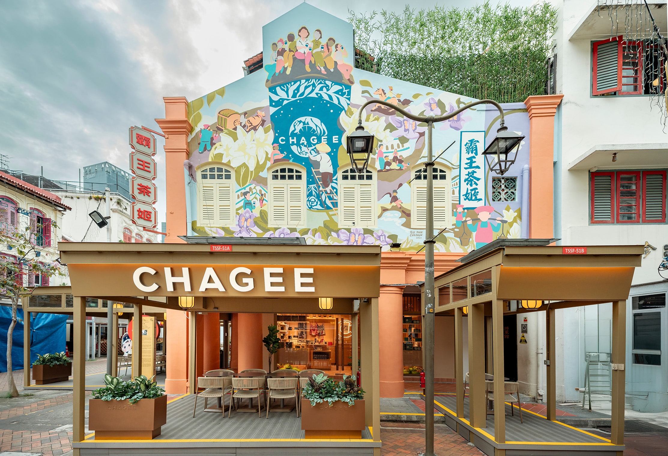 Exterior of CHAGEE Pagoda House in Singapore's Chinatown, featuring vibrant mural art and traditional shophouse architecture – new tea and retail concept 2025.