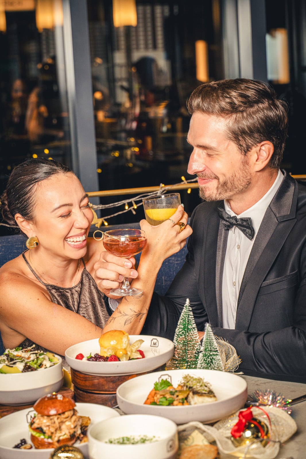 Festive Christmas Day lunch at Madison’s, Pullman Hill Street, with colleagues and friends toasting over gourmet brunch in a warm setting.