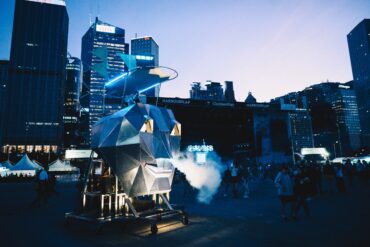 Silent disco installation at Clockenflap 2025 with Hong Kong skyline in view, blending music, urban design, and late-night energy.