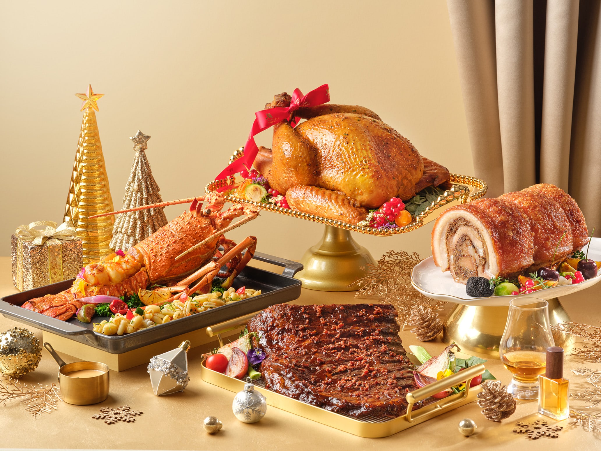 Luxurious Christmas takeaway spread from Singapore Marriott Tang Plaza Hotel with whole roast turkey, Iberico ribs, pork saddle, and Boston lobster.