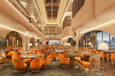 The main dining room at The Consul Bangkok, a modern members club in Bangkok featuring elevated Chinese cuisine and sweeping city views.