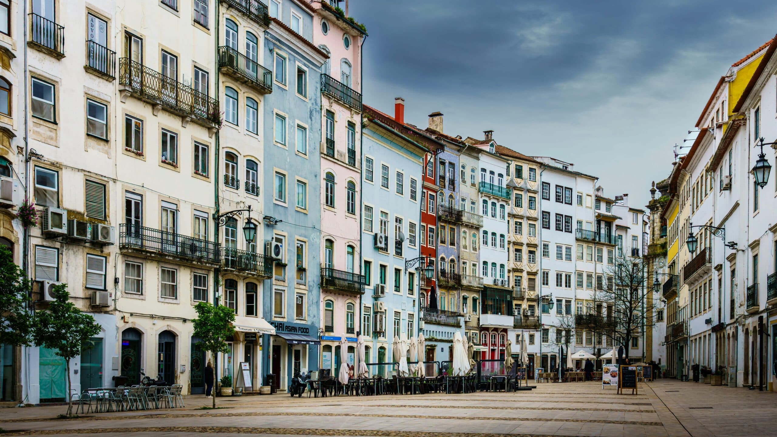 An old city square with al fresco cafes and restaurants