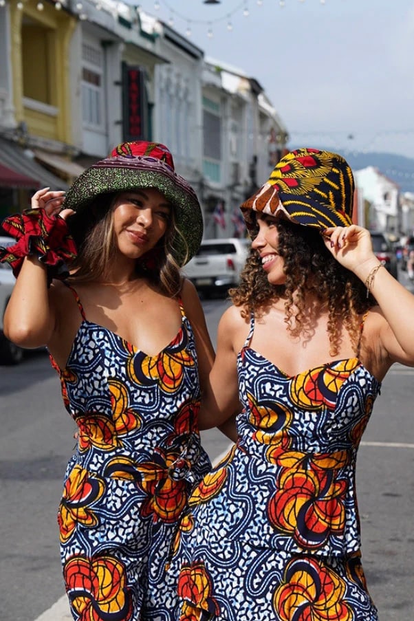 African wax print bucket hats and dresses by OliveAnkara, a colourful and sustainable gift idea for her or him.