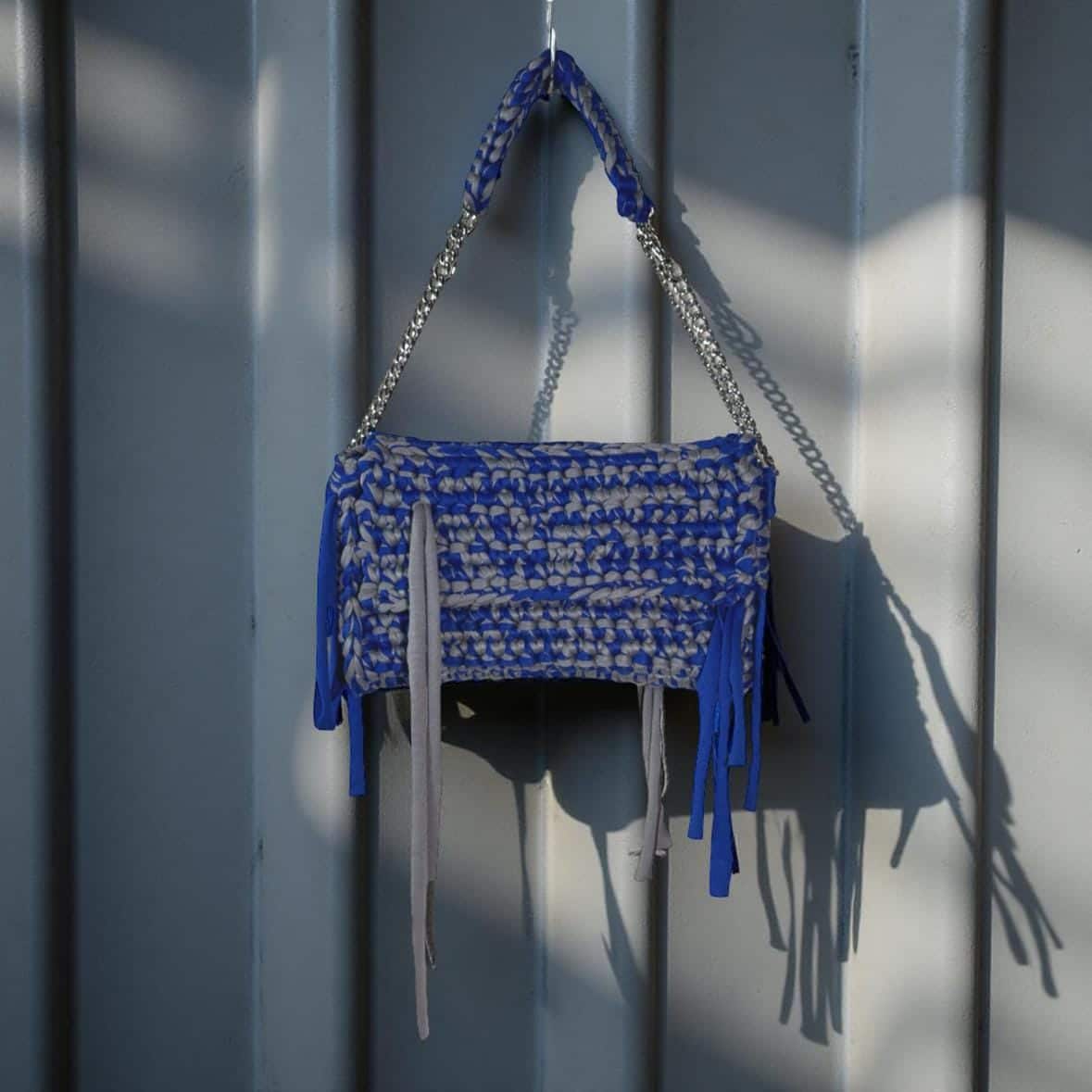 Hand-crocheted Dash Bag in blue-grey by Late For School, a limited-edition handmade gift from Singapore with 3-way styling — shoulder, hand, or clutch.