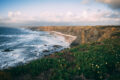 Dramatic cliffs and wild Atlantic coastline near Alentejo, Portugal, captured during golden hour — a breathtaking destination for road trippers.