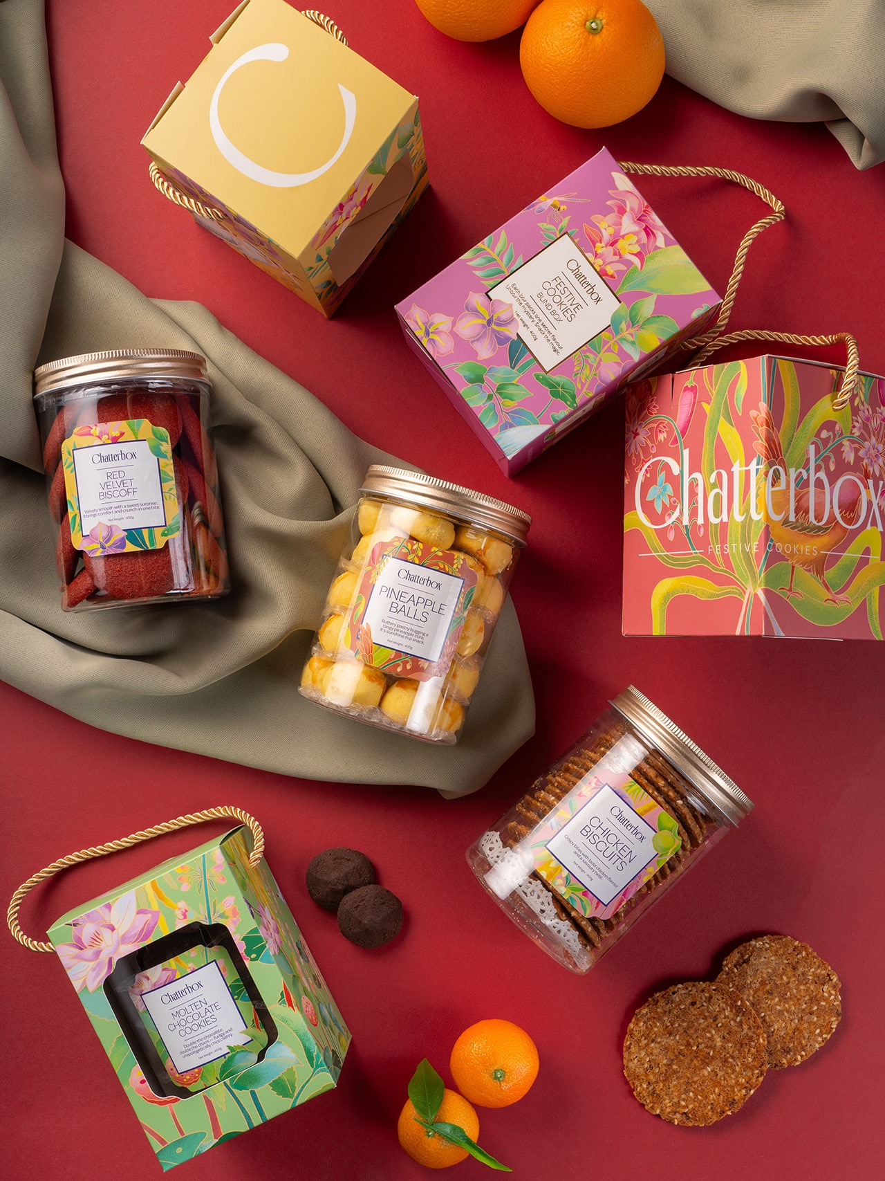 Chatterbox Chinese New Year cookie collection featuring pineapple balls, red velvet biscoff, and festive gift packaging