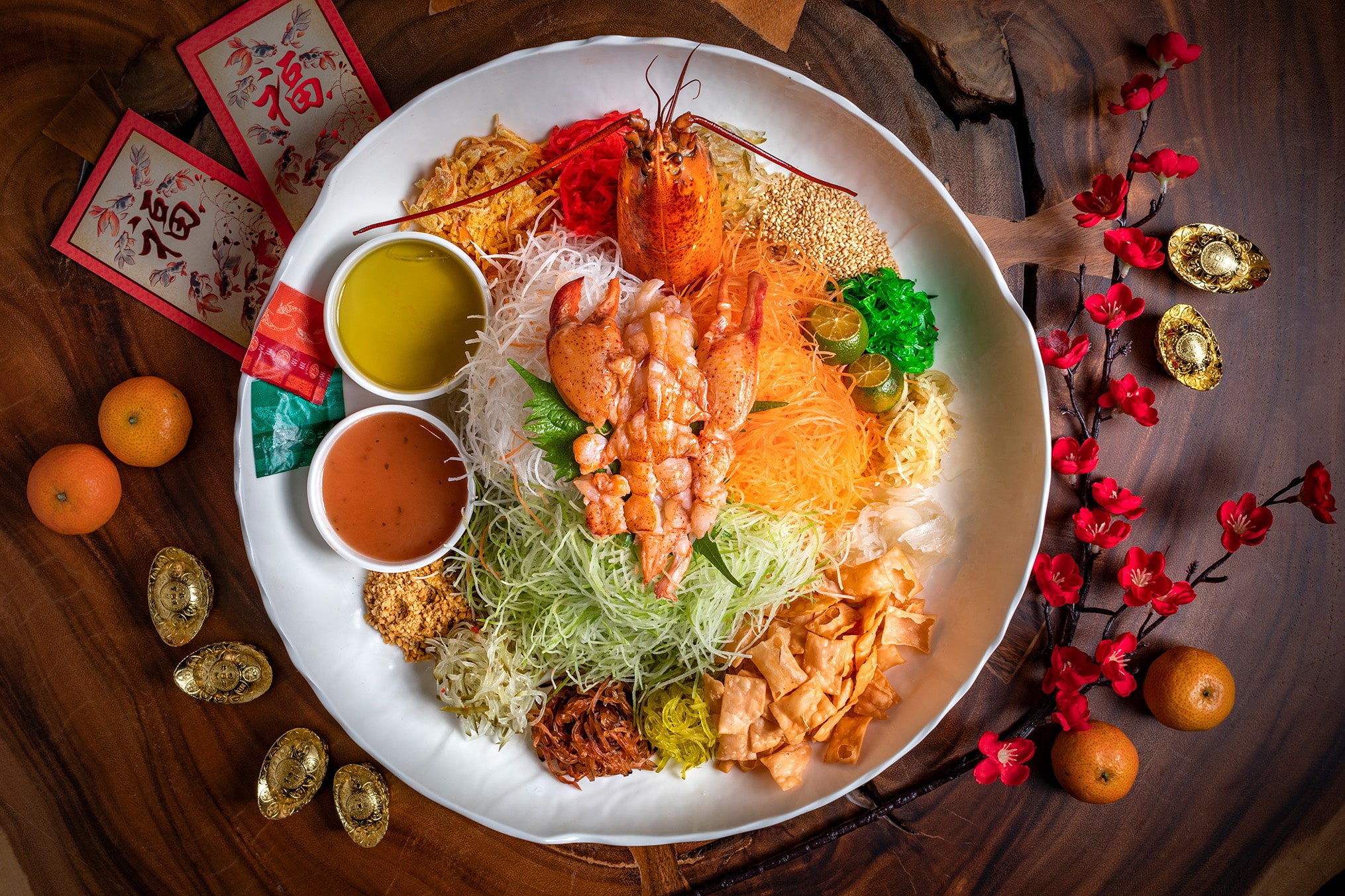 Boston lobster yu sheng takeaway from Greenwood Fish Market, featuring premium seafood and traditional lo hei ingredients