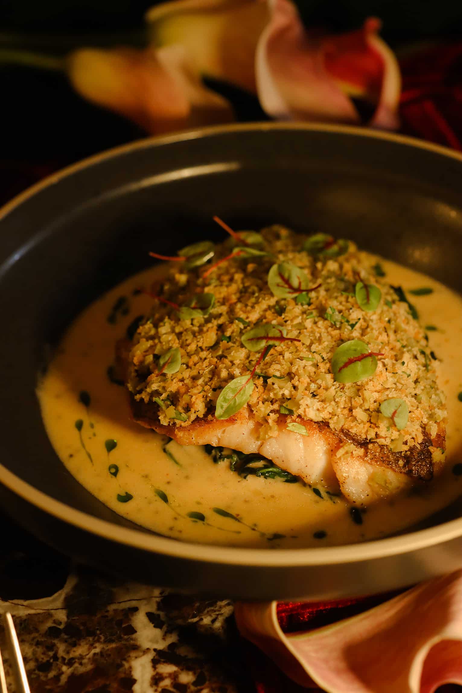 Grilled grouper fillet with adobo beurre blanc, herb crust, and caviar served at CUDO Singapore for Valentine’s Day dinner 2026.