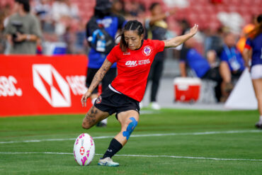 Singapore women’s rugby sevens player kicking the ball during SEA 7s action at the National Stadium, ahead of HSBC SVNS 2026 in Singapore.