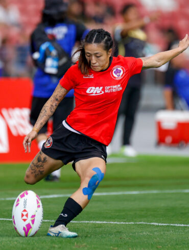 Singapore women’s rugby sevens player kicking the ball during SEA 7s action at the National Stadium, ahead of HSBC SVNS 2026 in Singapore.