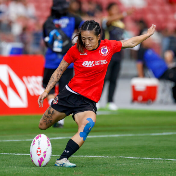 Singapore women’s rugby sevens player kicking the ball during SEA 7s action at the National Stadium, ahead of HSBC SVNS 2026 in Singapore.