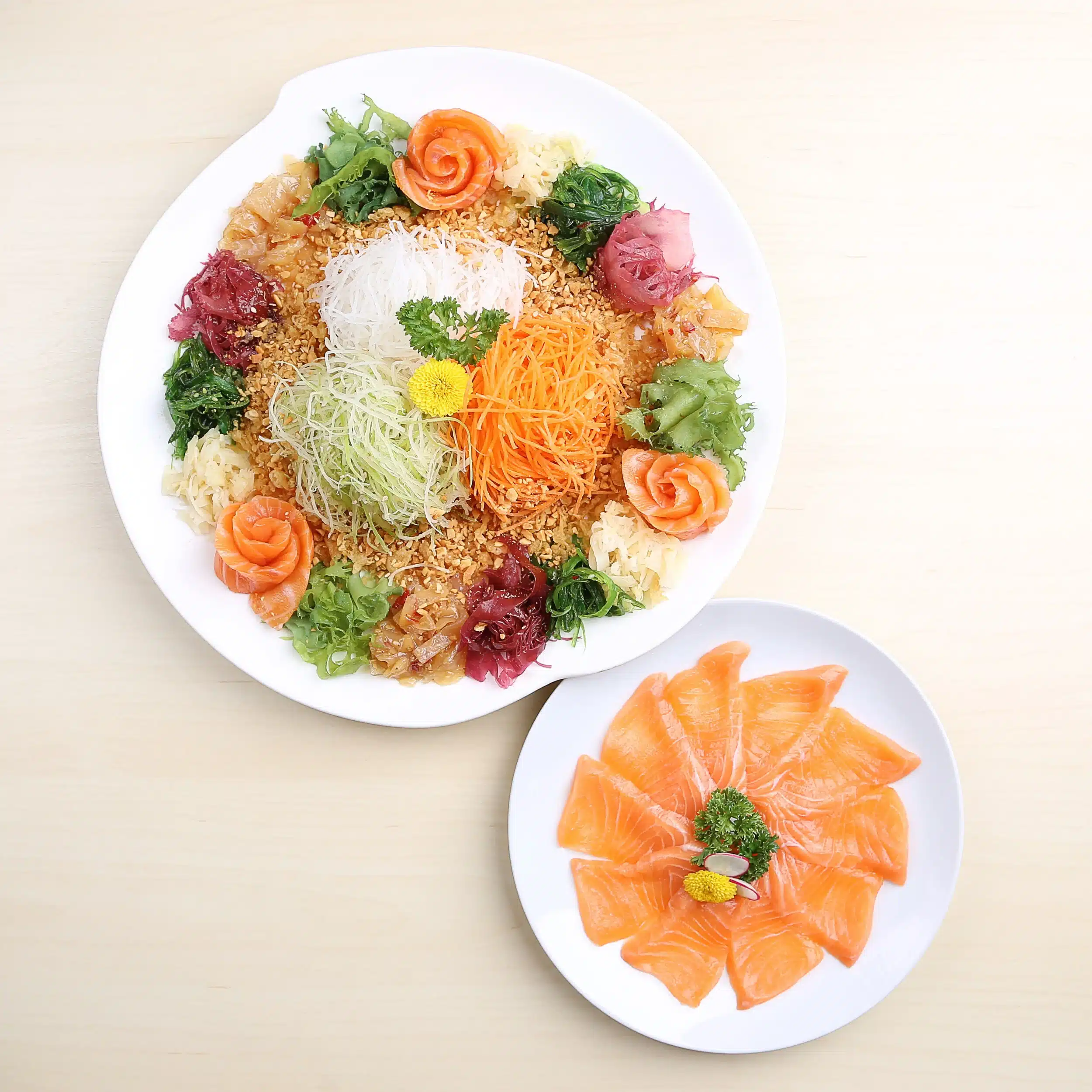 Japanese-style yu sheng platter from Standing Sushi Bar, a modern Chinese New Year takeaways 2026 option in Singapore